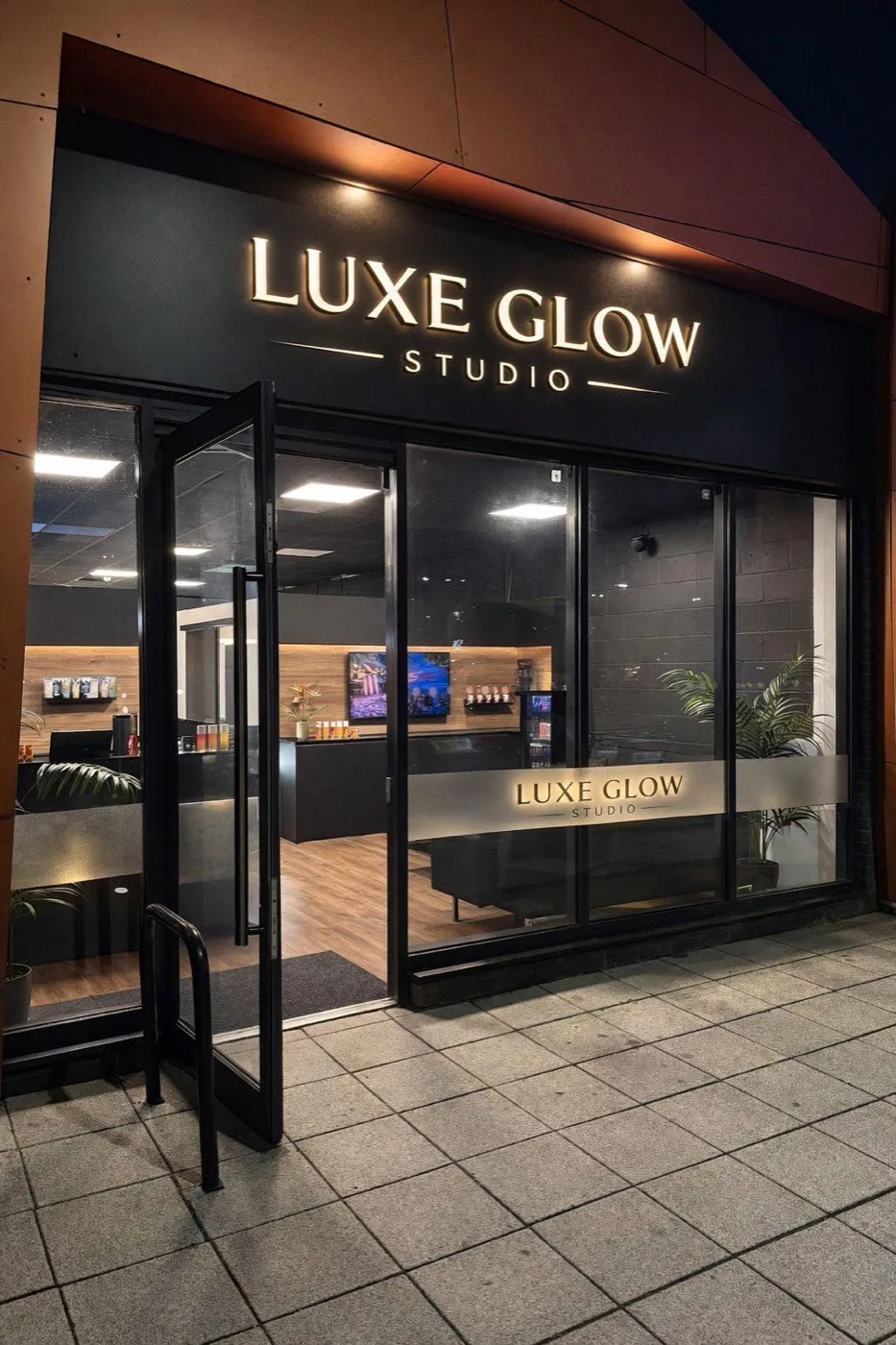 Premium sunbed tanning rooms inside Luxe Glow Studio.